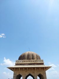 Low angle view of church against blue sky