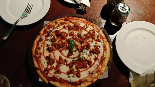 High angle view of pizza on table