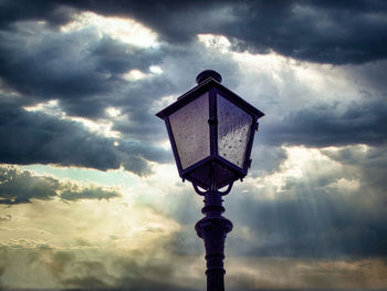 Low angle view of street light against sky