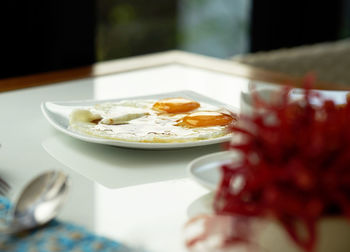 Close-up of breakfast served on table