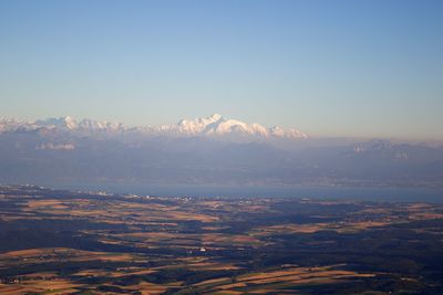 Scenic view of mountains against sky during winter