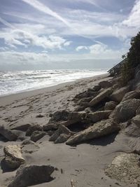 Scenic view of beach against sky