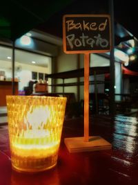 View of illuminated empty road