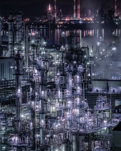 Illuminated oil refinery at night