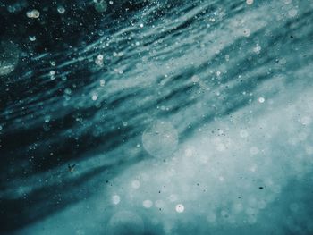 High angle view of waves in sea