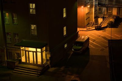 High angle view of illuminated buildings at night