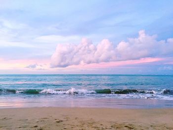 Scenic view of sea against dramatic sky