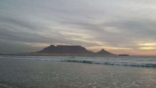 Scenic view of sea against sky at sunset