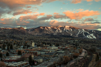 High angle view of town at sunset