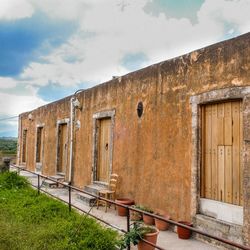 Abandoned building against sky