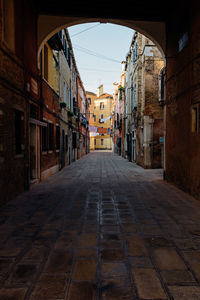 Narrow alley along buildings