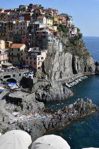 View of buildings by sea