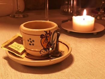 Close-up of coffee cup on table