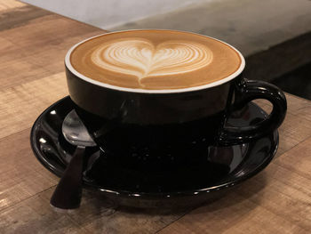 Close-up of cappuccino on table