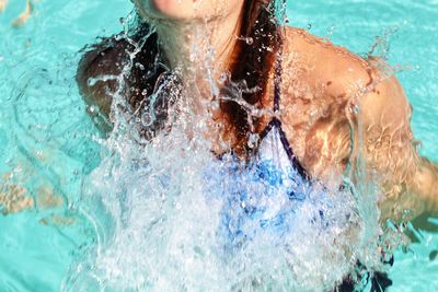 Man swimming in pool