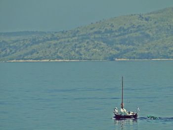 Boats sailing in sea