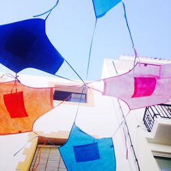 Close-up of multi colored umbrellas