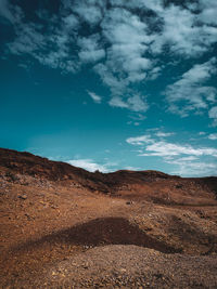 Scenic view of desert against sky