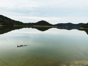 Scenic view of lake against sky