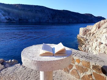 Scenic view of sea and rocks against sky