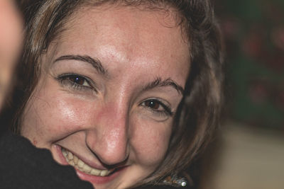 Close-up portrait of smiling woman