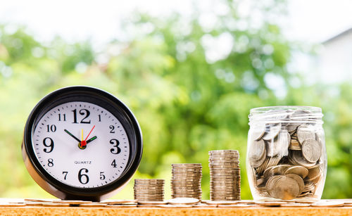 Close-up of clock on table