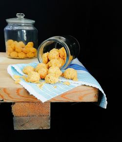 Close-up of cookies in jar on table