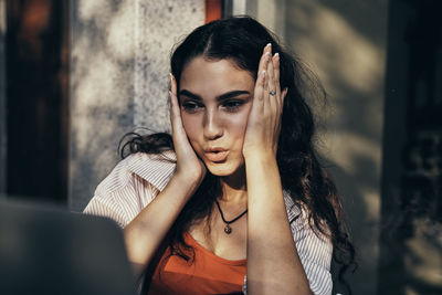 Young woman looking away