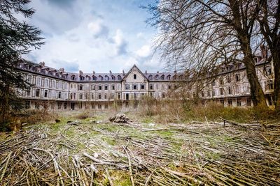 Abandoned building against sky