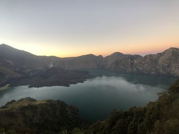 Scenic view of mountains against sky during sunset