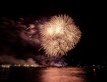 Firework display at night