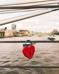 Heart shaped lock on steel cable