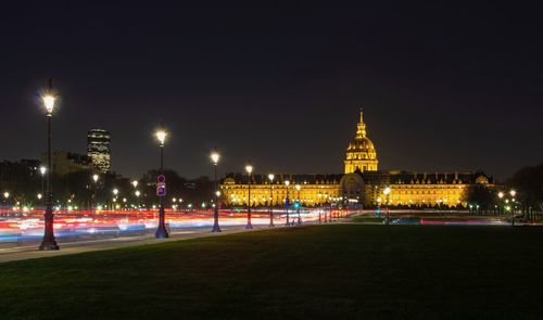 Illuminated buildings in city at night