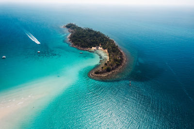 High angle view of sea against clear blue sky