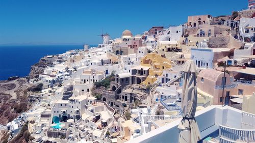 High angle view of town by sea