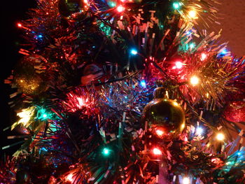 Illuminated christmas tree at night