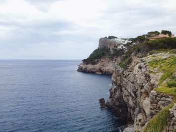 Scenic view of sea against cloudy sky