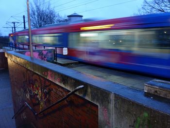 Train on railroad track against sky