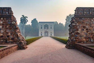 Humayun tomb entrance gate at misty morning from unique perspective