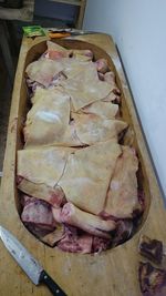 High angle view of meat on cutting board