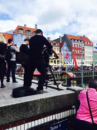 Buildings in city against sky