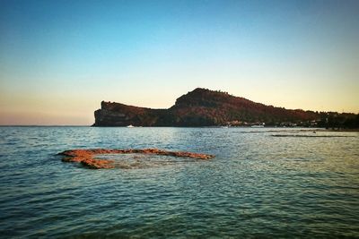 Scenic view of sea at sunset