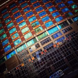 Low angle view of modern building at night