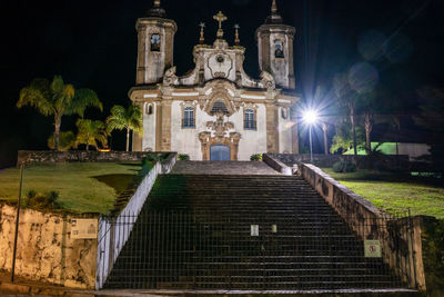 Low angle view of illuminated building at night