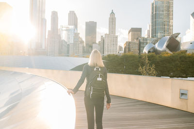 Woman looking at city skyline