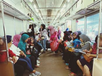 People sitting in corridor