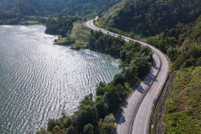 High angle view of road amidst trees