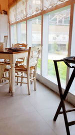 Empty chairs and table in restaurant