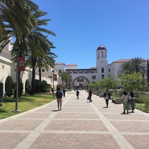 People at town square against clear sky