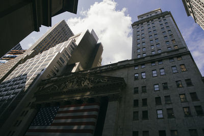 Low angle view of skyscrapers against sky